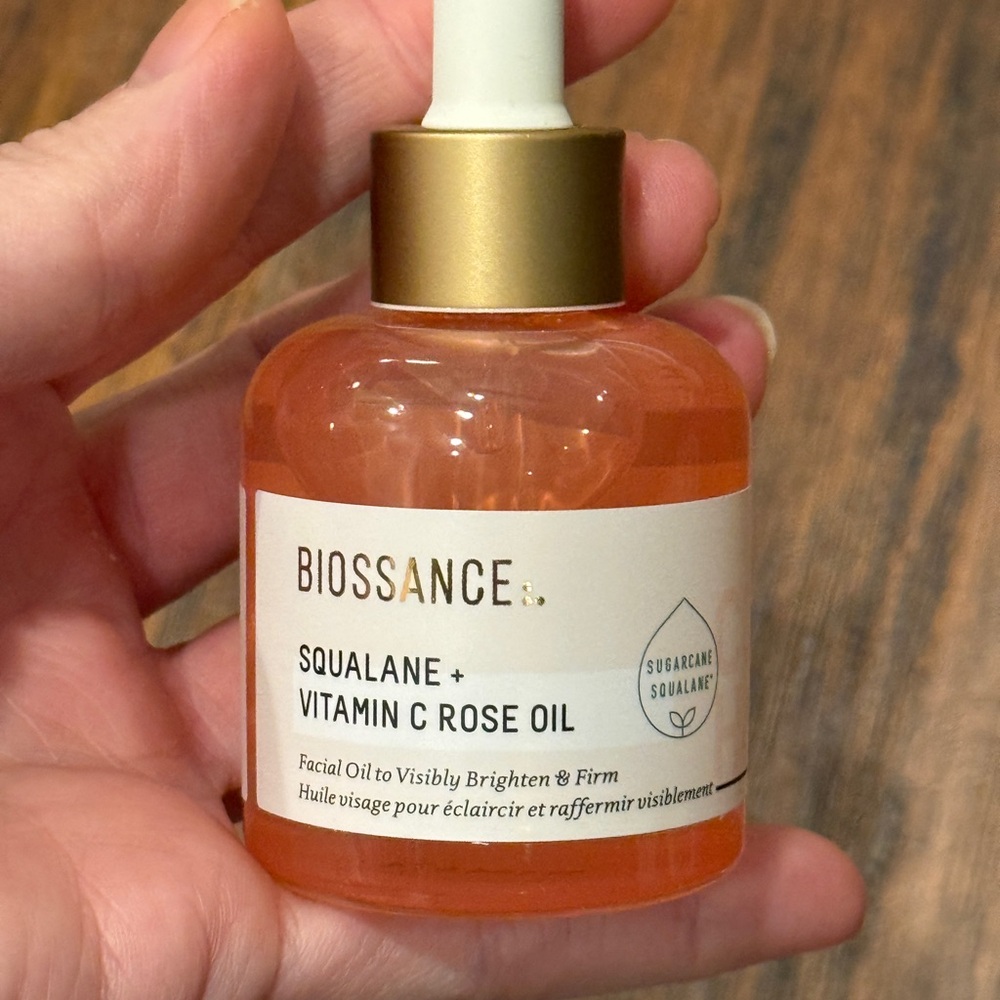 Biossance Squalane + Vitamin C Oil in Gold and White